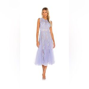Bronx and Banco, size 4. Fabulous, chic and flattering draping. A show stopper!